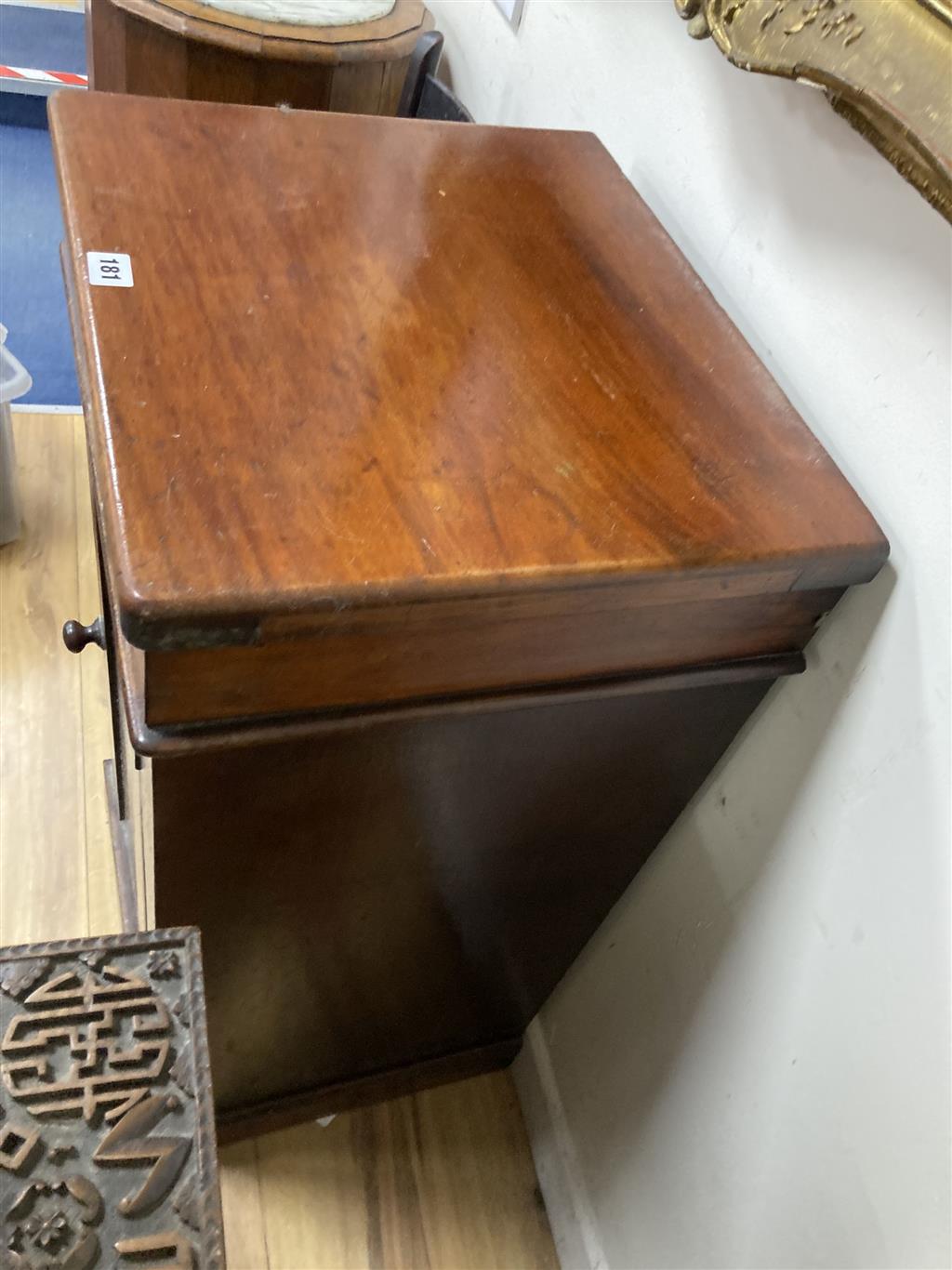 A Victorian mahogany pedestal cupboard, width 46cm depth 40cm height 87cm, together with a childs correction chair